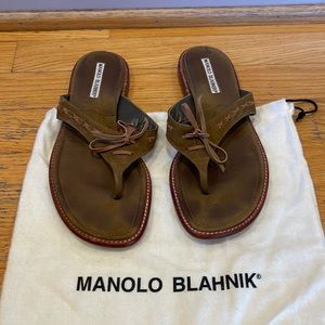 Manolo Blahnik brown leather flat sandal with leather tie accent in size 37.5